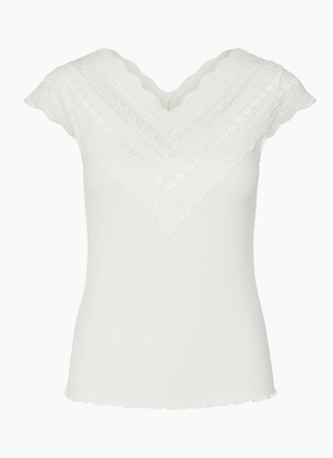 BLUS MED V-RINGNING OCH SPETSDETALJ