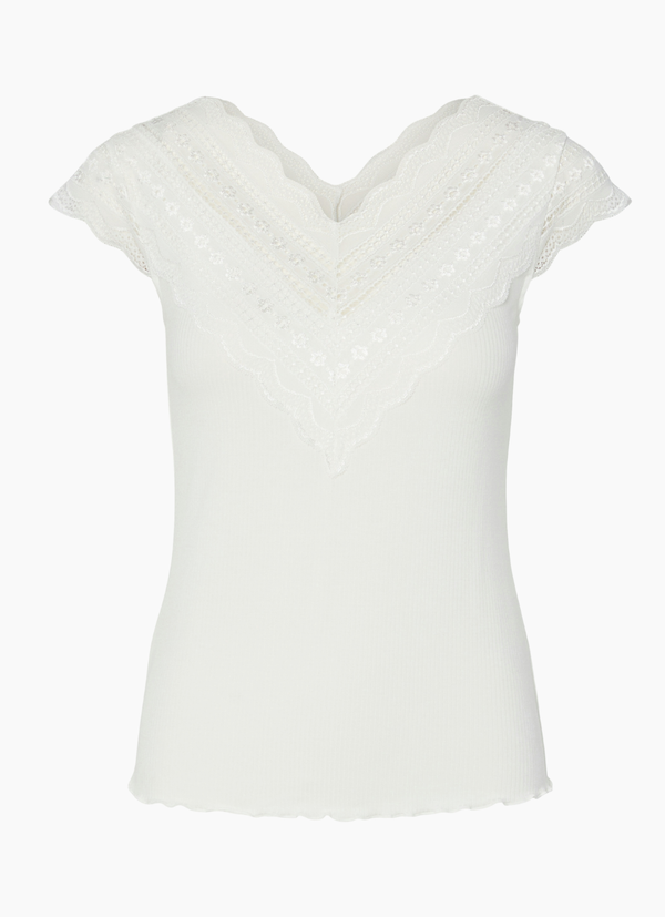 BLUS MED V-RINGNING OCH SPETSDETALJ