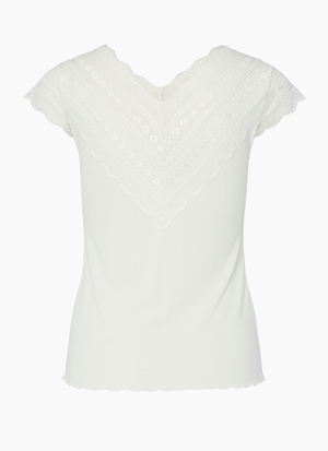 BLUS MED V-RINGNING OCH SPETSDETALJ