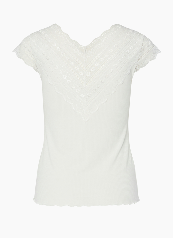 BLUS MED V-RINGNING OCH SPETSDETALJ