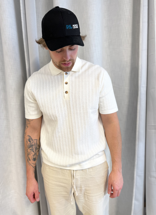 STICKAD POLOTRÖJA MED STRUKTUR