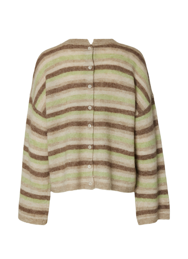 Mjuk stickad tröja med knäppning bak och lång ärm