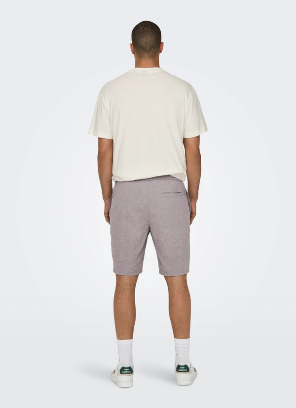 LINNEBLANDADE SHORTS MED AVSLAPPNAD PASSFORM