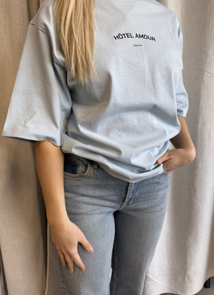 T-SHIRT MED PRINT OCH AVSLAPPNAD PASSFORM